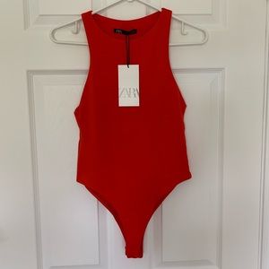 red bodysuit